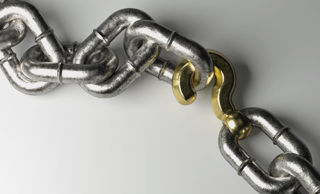 bigstock-A-Worn-Metal-Chain-With-A-Gold-466674097